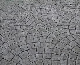 Imprinted concrete patterns recommended to stamp driveways.